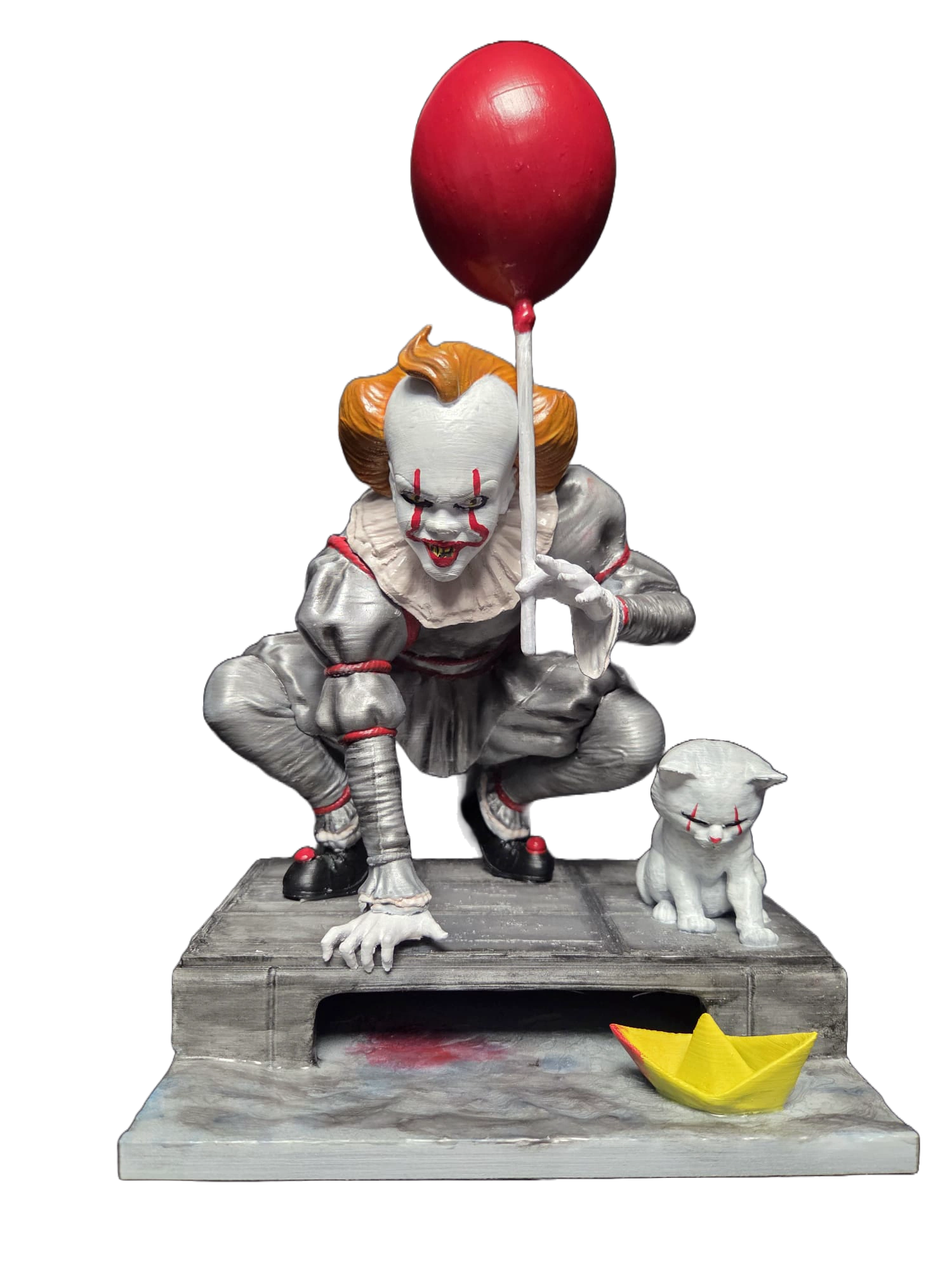 Pennywise Clown Figure 3D printed in PLA+ and hand painted with red balloon, yellow paper boat and sewer display base, approximately 27cm high
